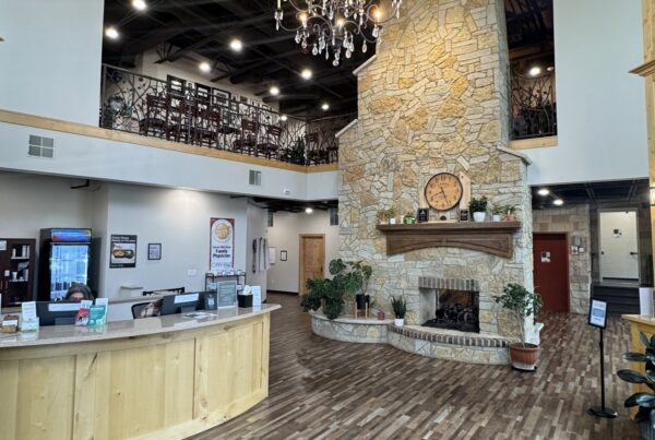The two story lobby at CMR Health Group in Yorkville, IL, with the front desk below and the upper level above