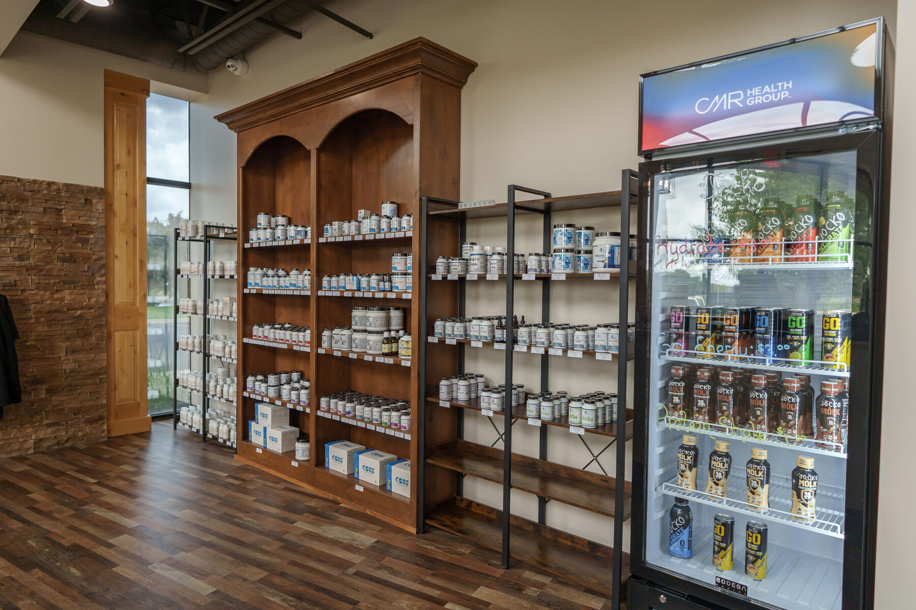 Shelves of practitioner-grade supplement brands at the CMR Health Group retail store in Yorkville, IL