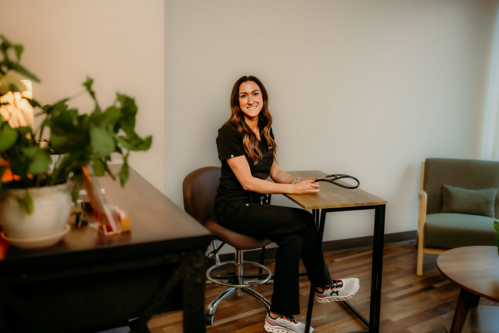Kelsey, nurse practitioner at CMR Health Group in Yorkville, IL, seated in a consult room