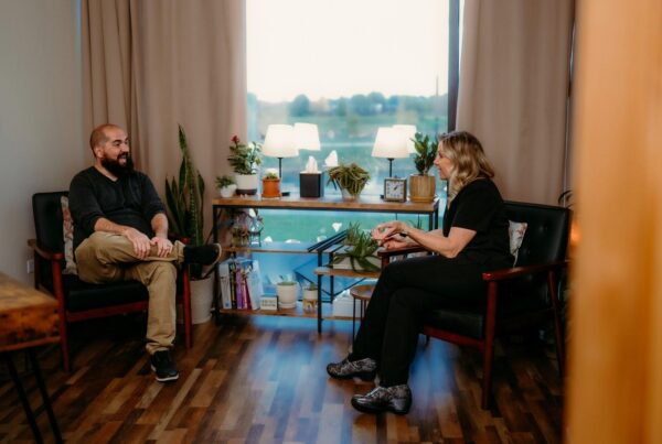 Jori Carnithan, NP, talking with a patient during a consult at CMR Health Group in Yorkville, IL