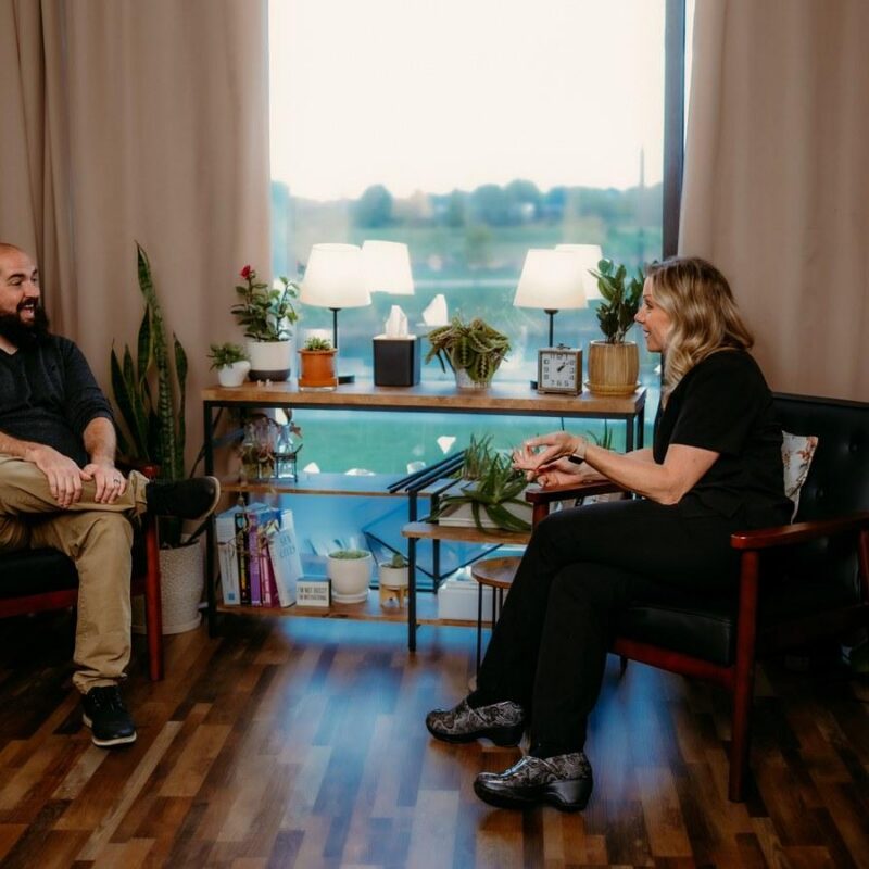 Jori Carnithan, NP, talking with a patient during a consult at CMR Health Group in Yorkville, IL