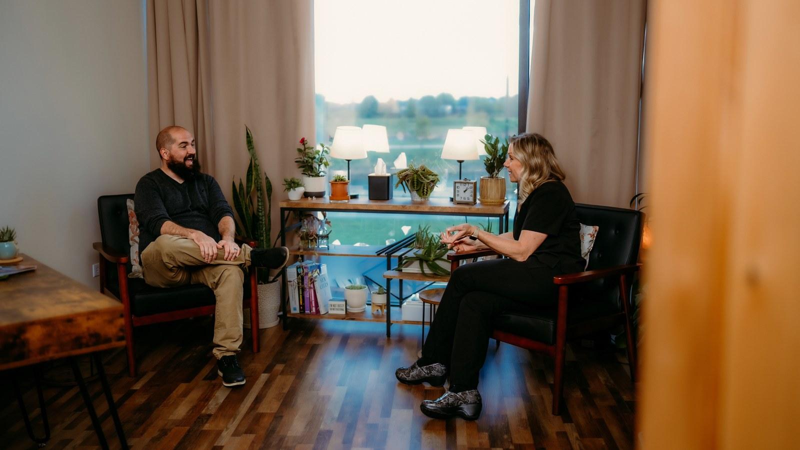 Jori Carnithan, NP, talking with a patient during a consult at CMR Health Group in Yorkville, IL